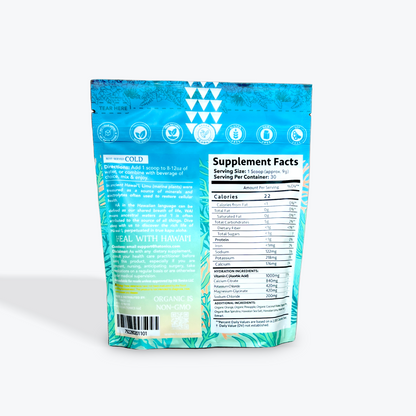 Back of a blue and green supplement package showing directions, product icons, supplement facts, ingredients, barcode, and part of a tropical leaf design.